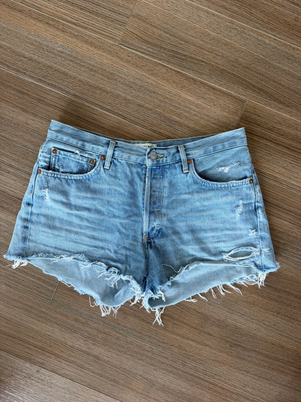 Agolde Light Blue Distressed Denim Shorts